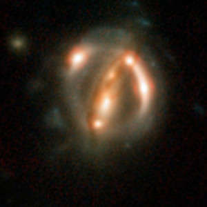 B1608+656 is among the five best lensed quasars discovered to date. The two foreground galaxies smeared the light of the more distant quasar's host galaxy into bright arcs.